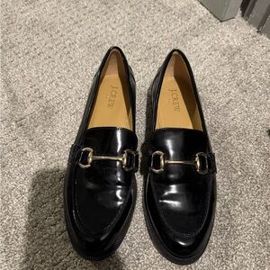 J. Crew Shiny Black Loafers with Gold Accent